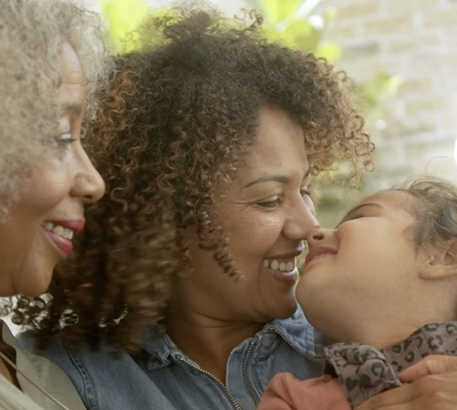 Smiling women and child