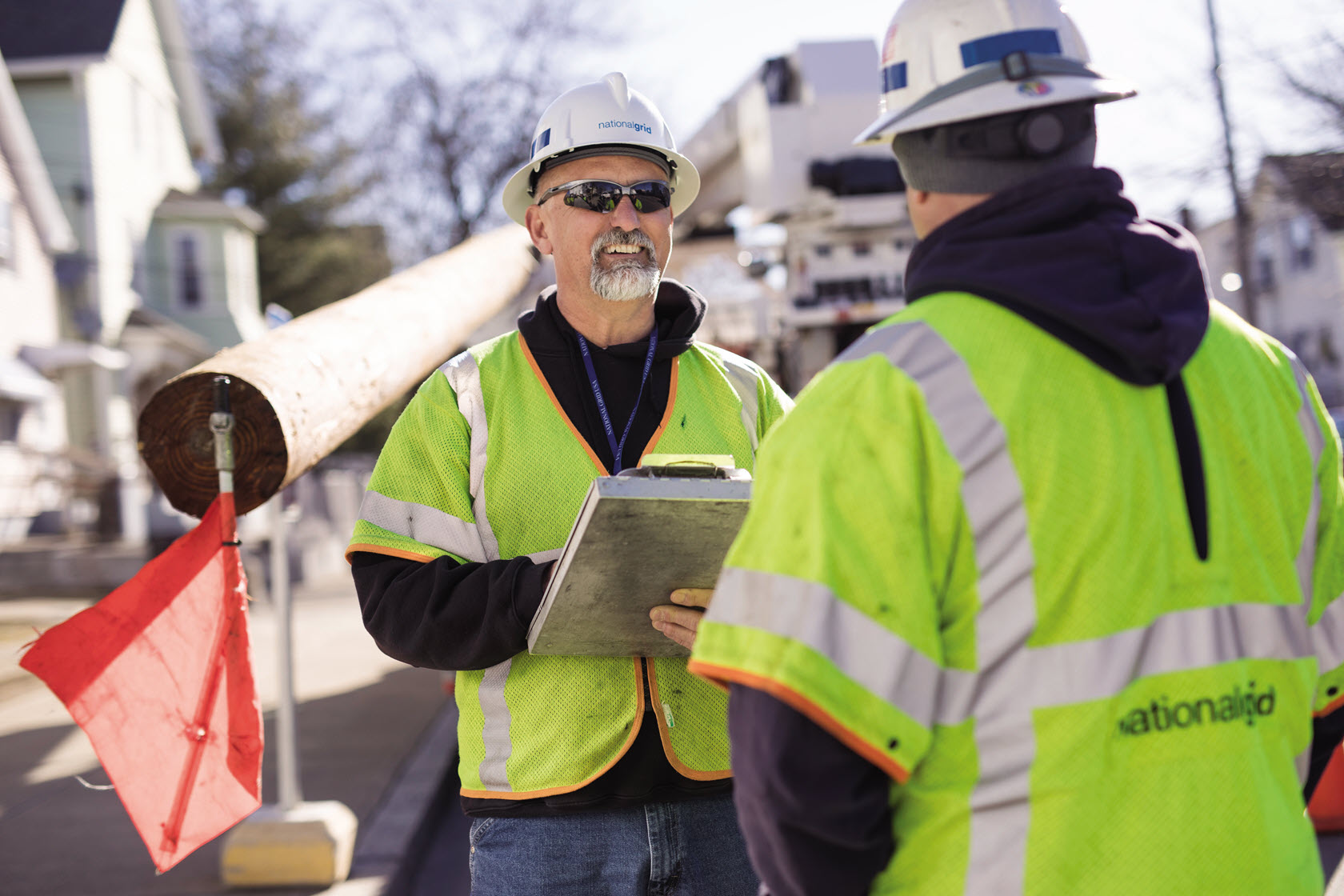 Two men in hard hats